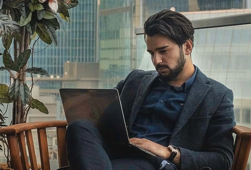 Entrepreneur Working In Laptop