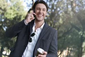 A confident man smiling