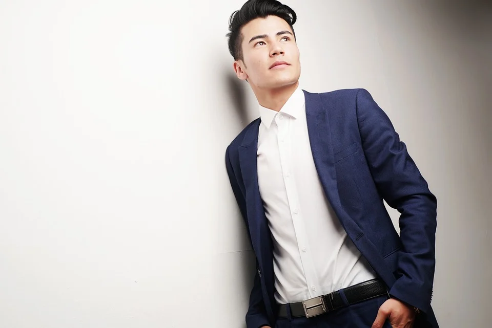 An attractive man in a blue suit