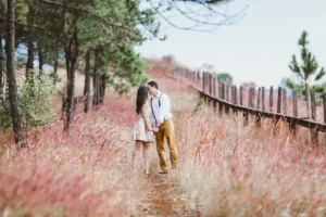 A couple kisses on a spring date